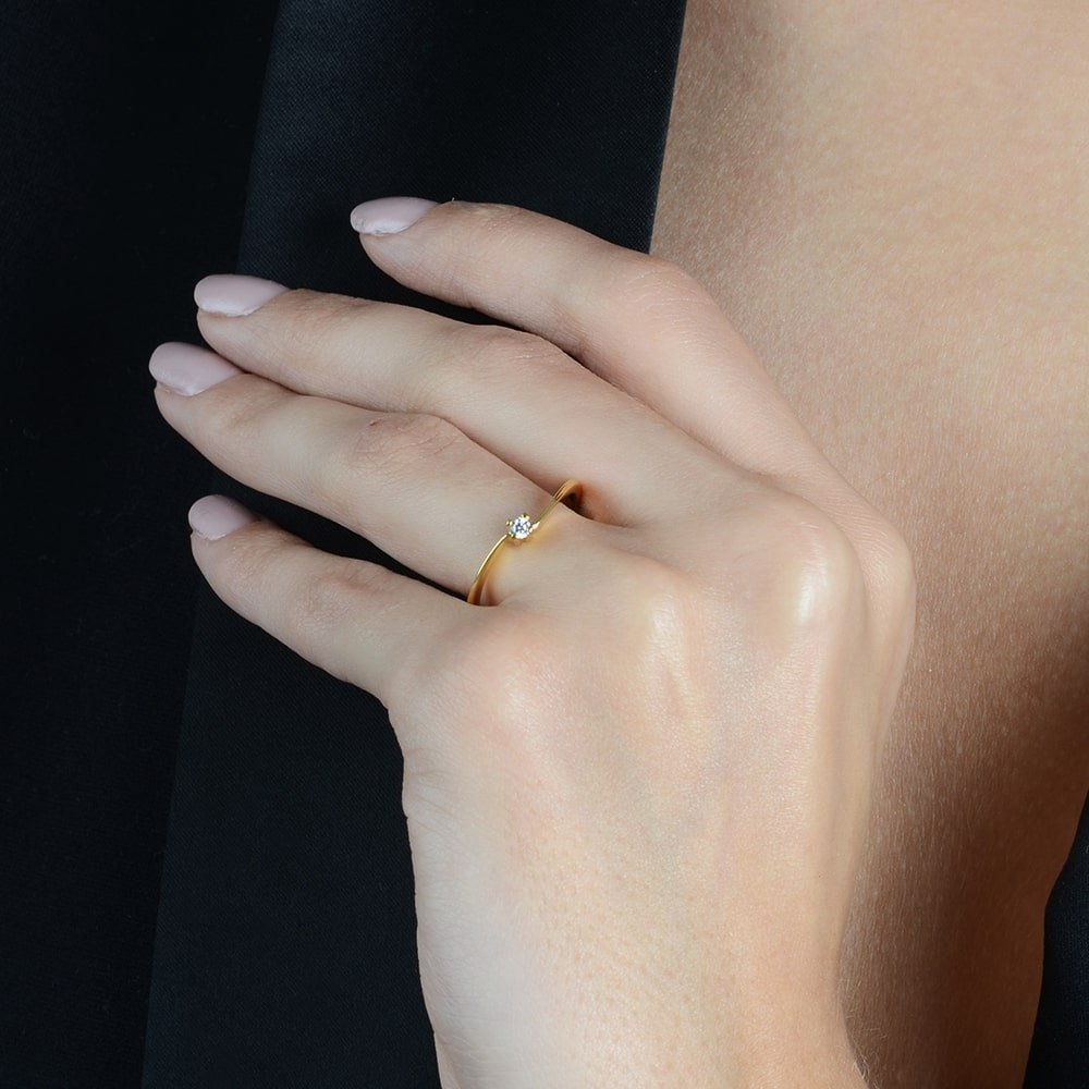 Delicate Gold Solitaire Ring with Zirconia