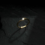 Gold Solitaire Ring with Zirconia Point of Light