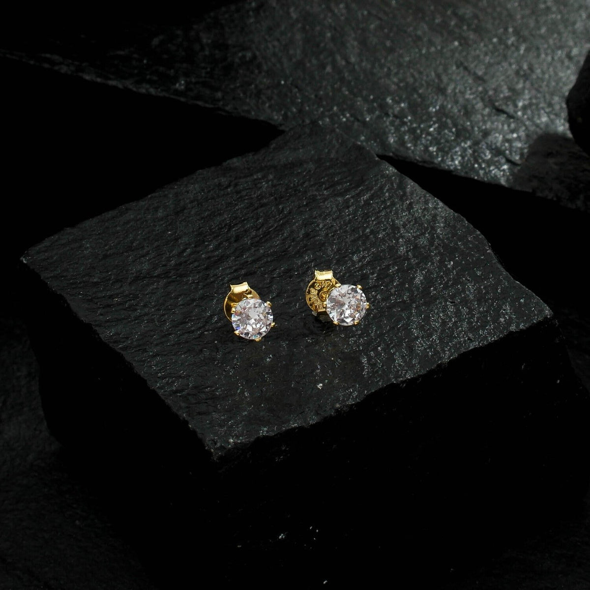 Small Zirconia Point of Light Stud Earrings